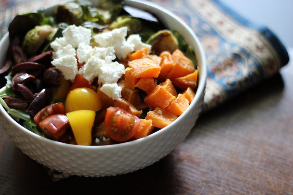 Greek salad with roasted vegetables, feta, and tomatoes