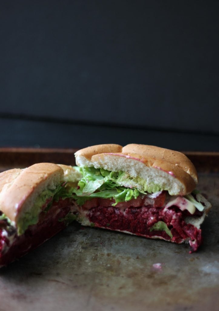 Vegetarian Beet Burger with Garlic Sriracha Aioli on a baking sheet. 