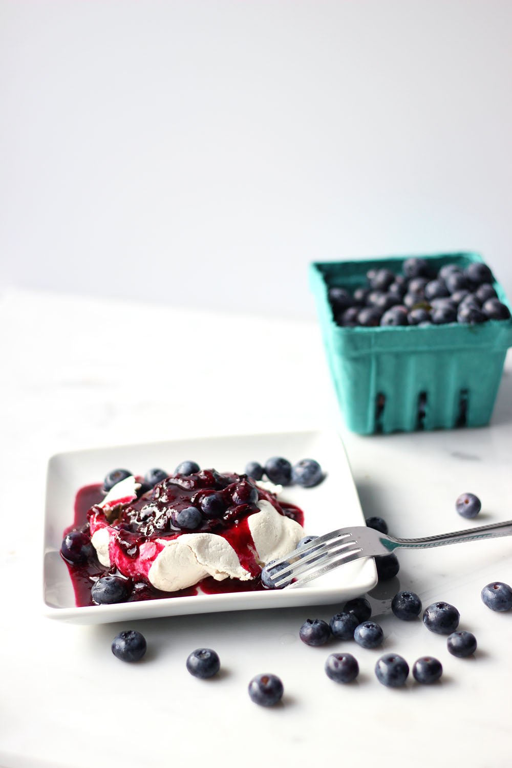 Pavlova with Boozy Blueberry Sauce