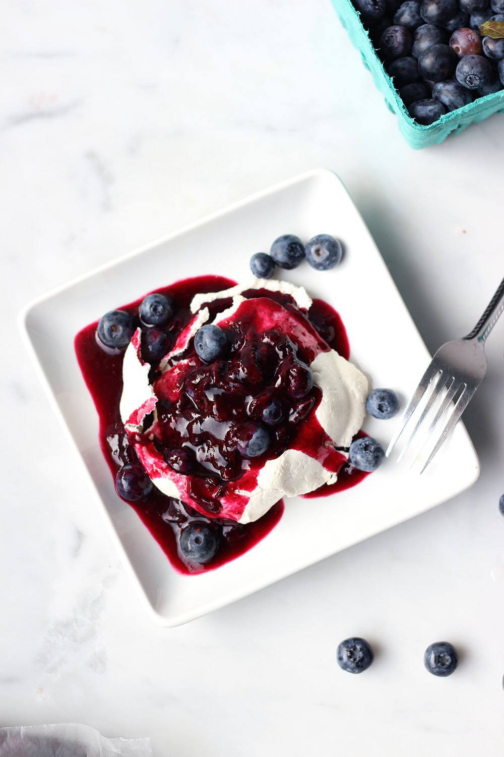 Pavlova with Boozy Blueberry Sauce