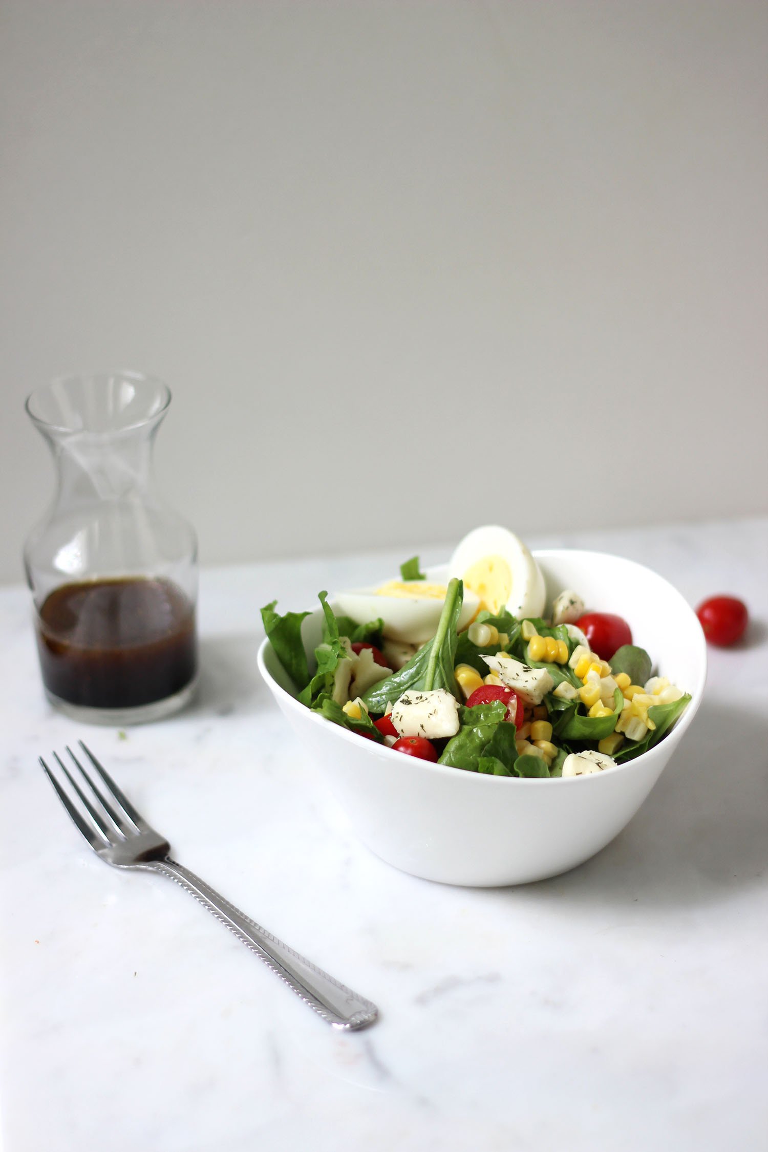 Summer Salad with Corn, Arugula, and Balsamic Vinaigrette.