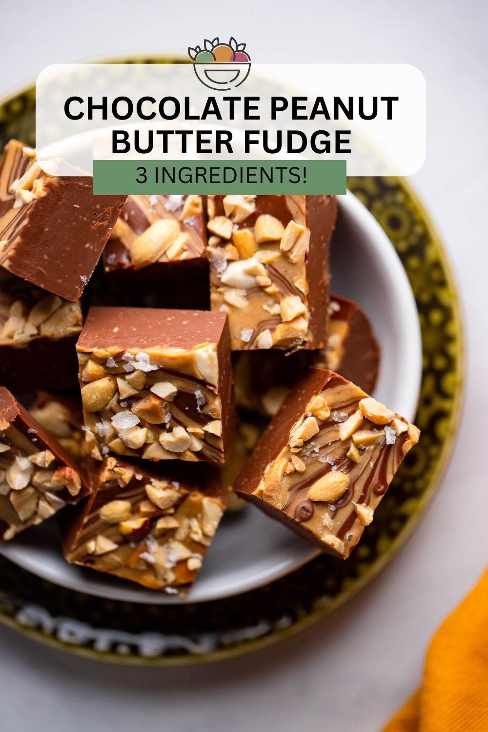 fudge in pan garnished with chopped peanuts before chilling.