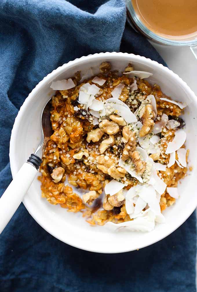 Vegan Carrot Cake Oatmeal top down in white bowl with spoon