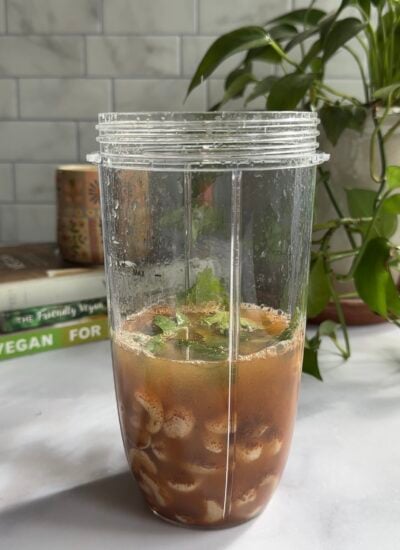 salad dressing ingredients in a small blender cup.