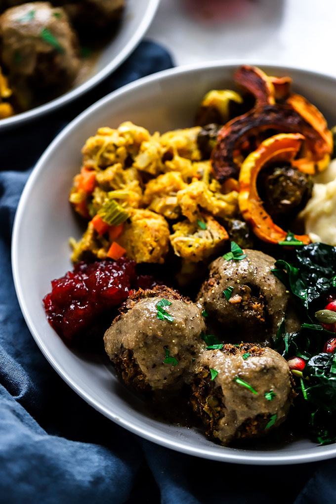 Vegan Meatballs with Mushroom Gravy close up in gray dish