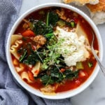 Vegetarian Lasagna Soup in white bowl with blue napkin