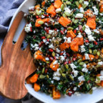 Winter Kale Salad | A healthy addition to your holiday gatherings! Made with roasted butternut squash, pomegranate, and goat cheese.