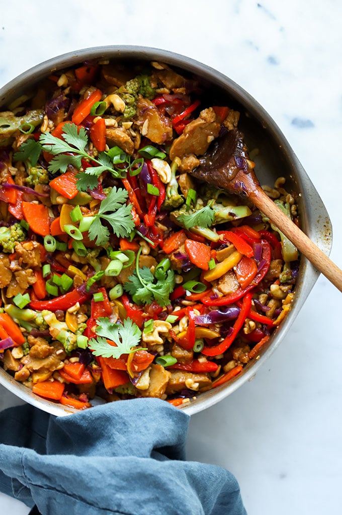 Vegan Cashew Chicken Stir Fry in skillet garnished with cilantro.