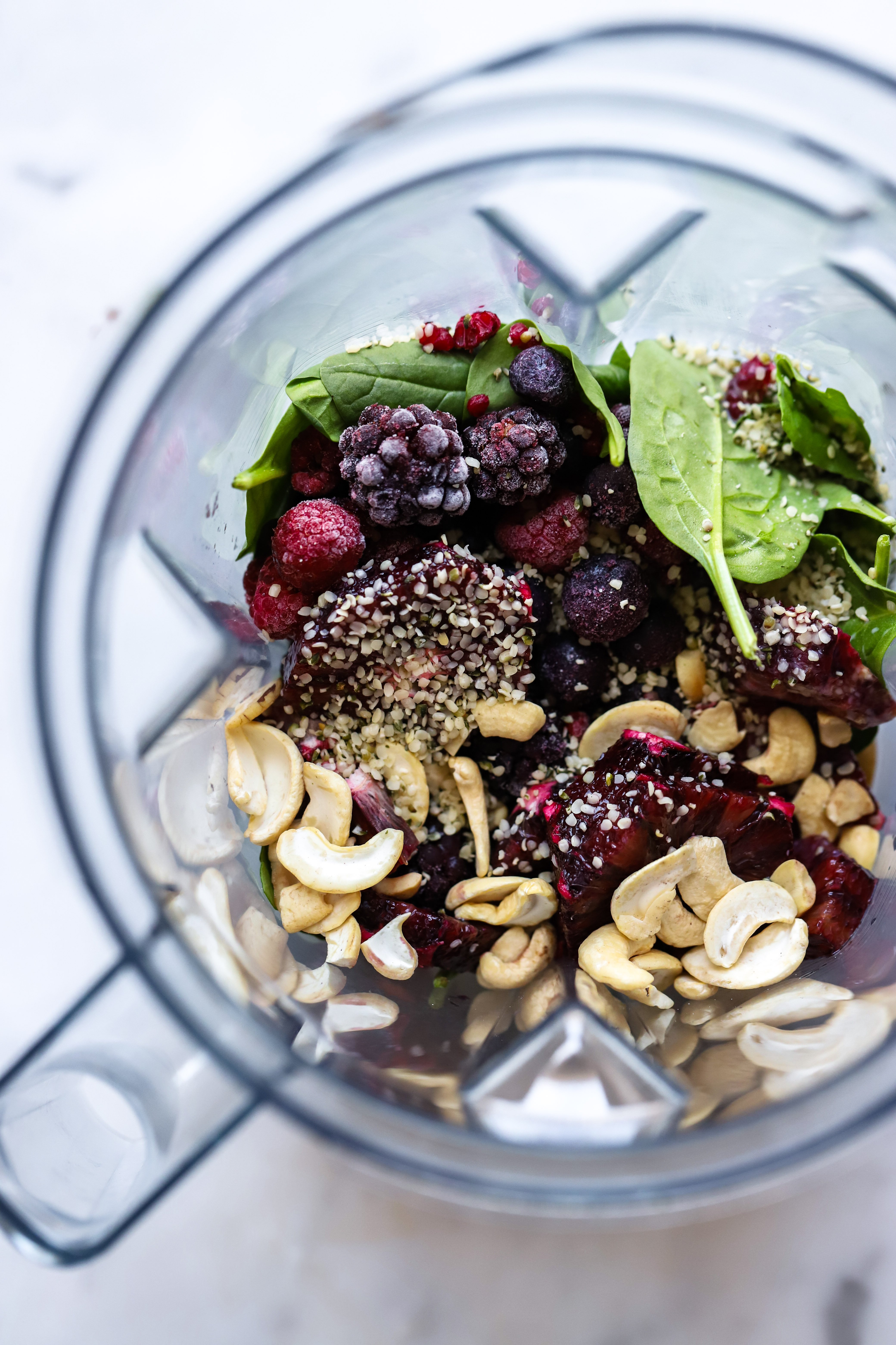 blueberry cashew smoothie ingredients in blender. 