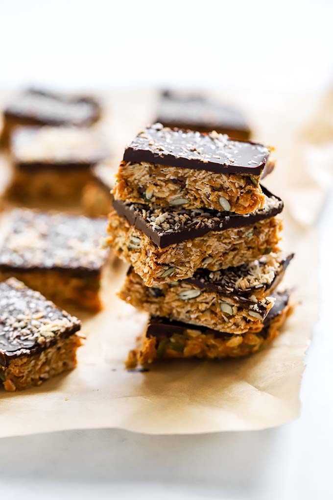 no bake peanut butter oat squares stacked on top of each other. 