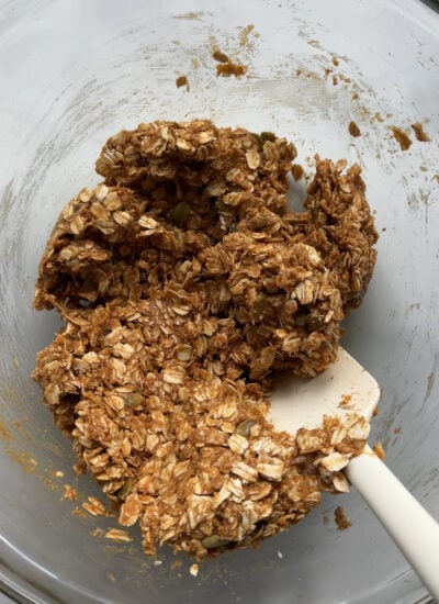 peanut butter mixture and oats stirred together in a large bowl.