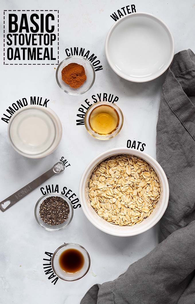 Basic stovetop oatmeal ingredients layer out in bowls with text