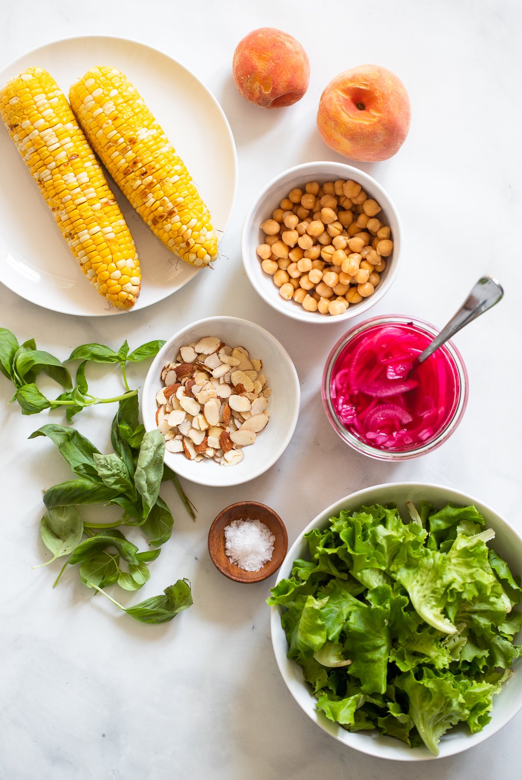 summer peach salad with grilled corn and almonds ingredient shot