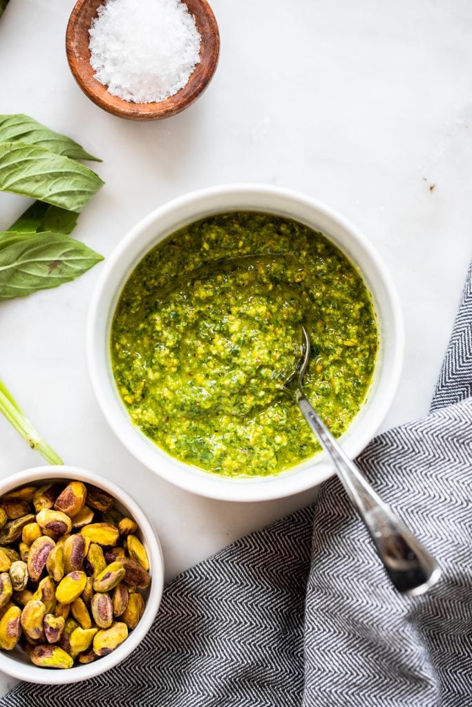 vegan pesto in small bowl with spoon