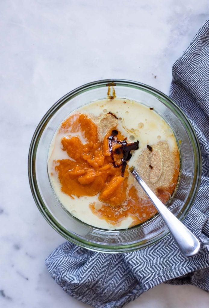 mix the pumpkin, flax egg, oil, milk, and molasses together in a bowl.