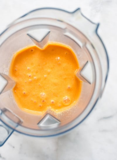 blended steamed carrot, potato, broth, and yeast in blender pitcher.