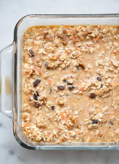 carrot cake baked oatmeal in glass baking dish before baking. 