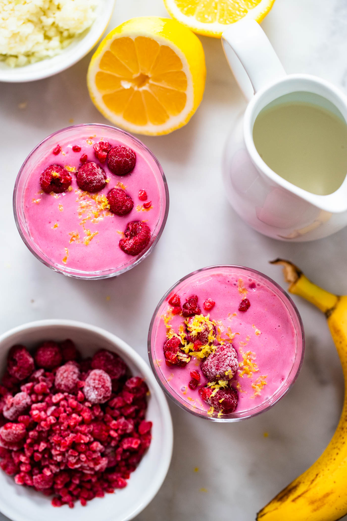 Pink lemon raspberry smoothie with toppings