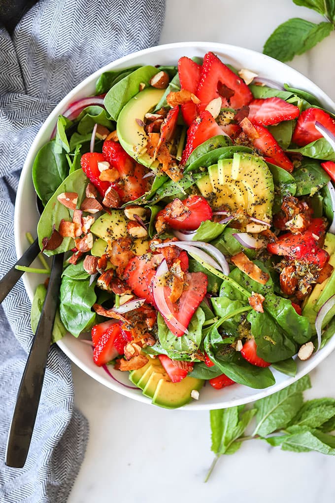 strawberry spinach salad with avocado and almonds.