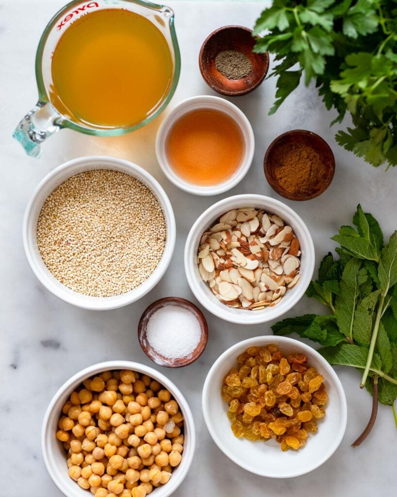 curry spiced quinoa ingredients in bowls. 