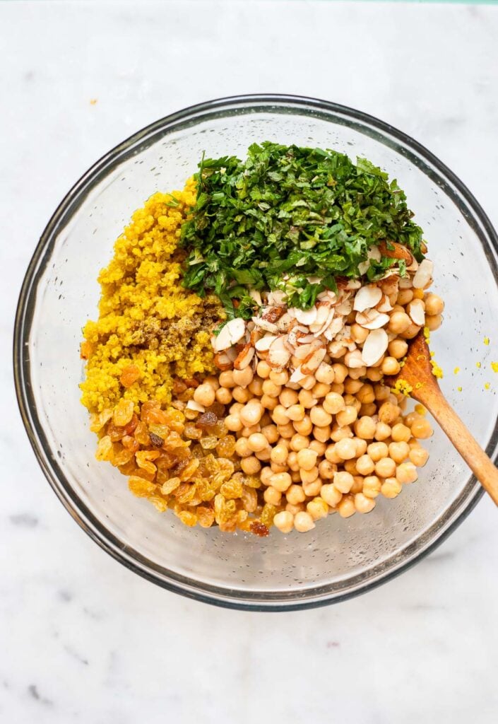 add cooked quinoa to a large bowl with the rest of the ingredients.