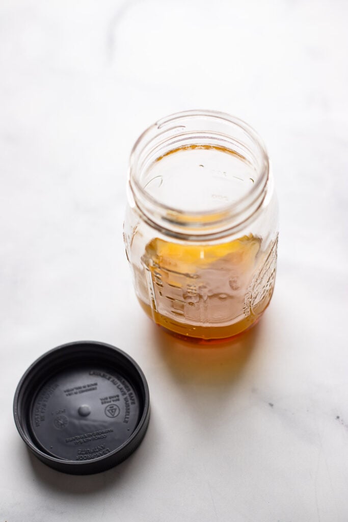 salad dressing ingredients in mason jar.