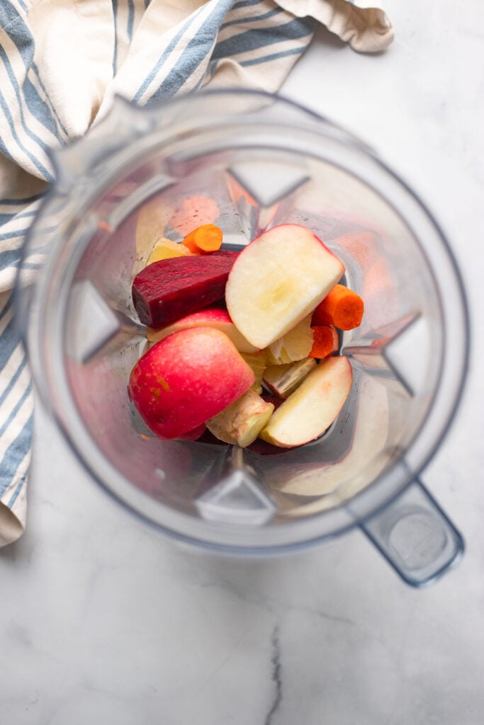 add all of the beet juice ingredients to a blender.