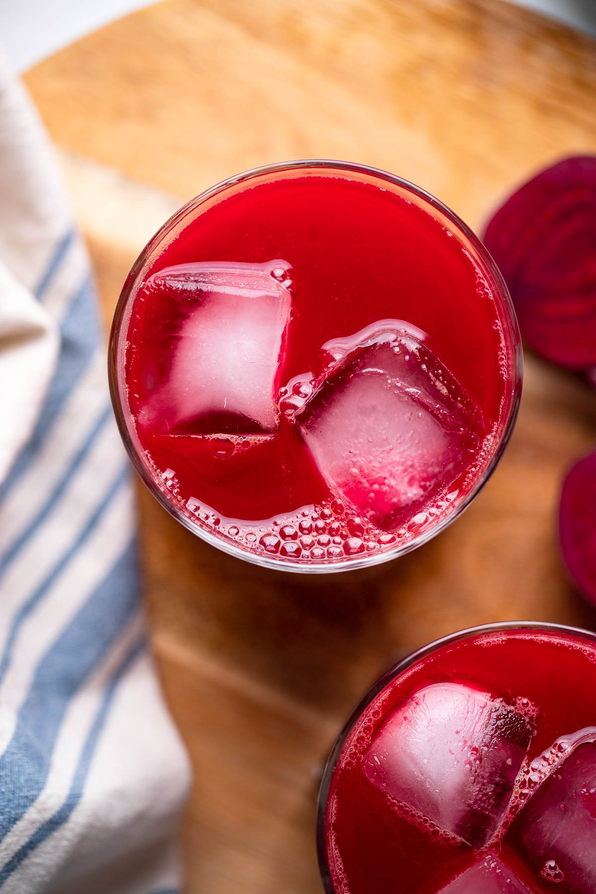 blender beet juice in glass with ice.
