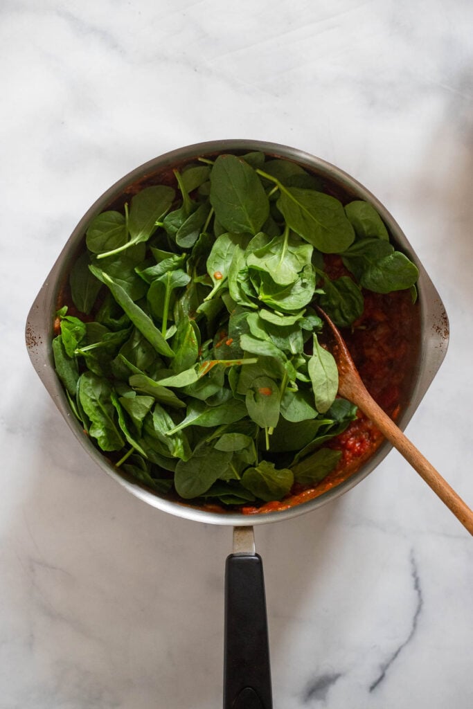 Add the spinach and cook until wilted.