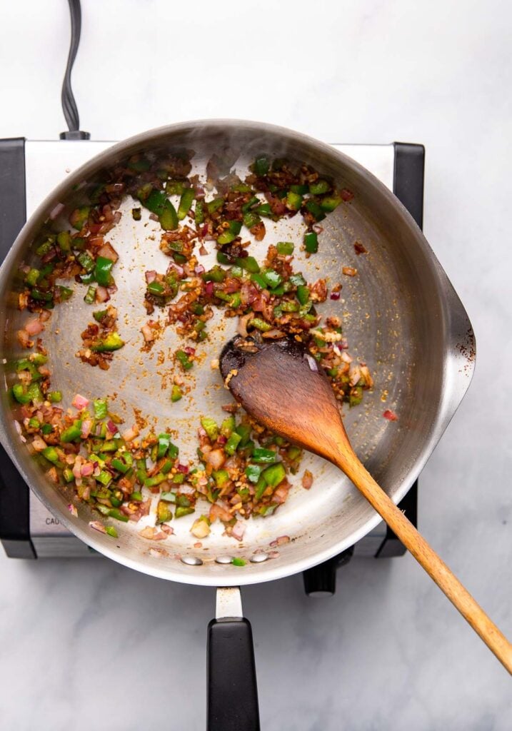 Stir in the garlic and taco seasoning.
