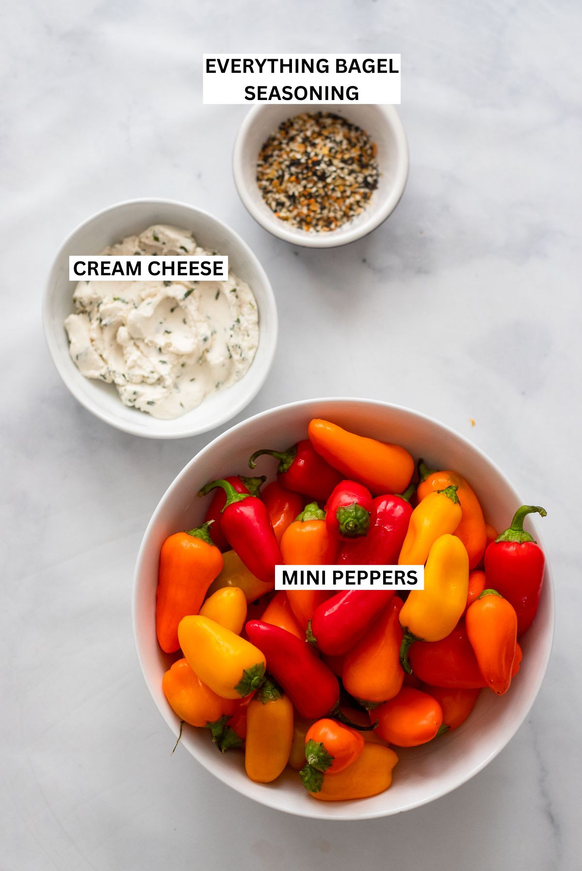 stuffed mini pepper ingredients in bowls.