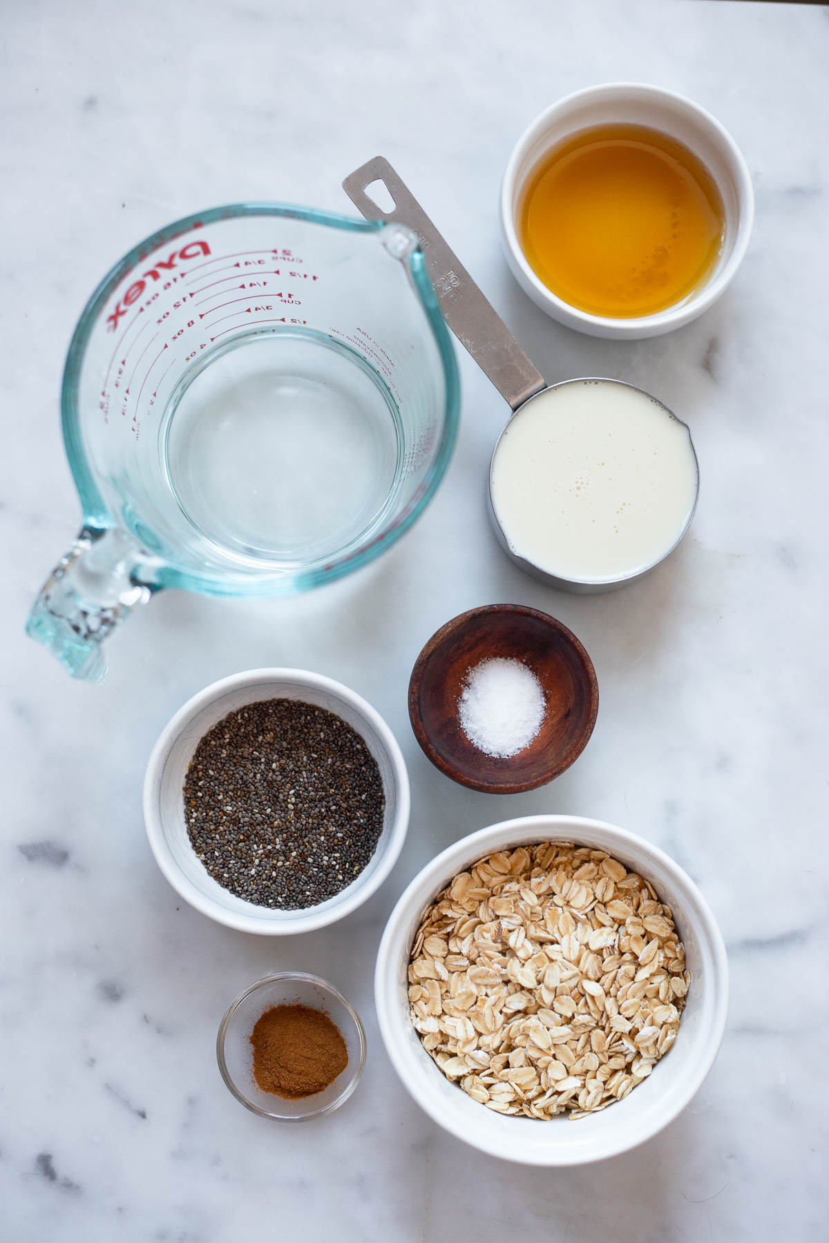 cinnamon oatmeal ingredients in small bowls. 