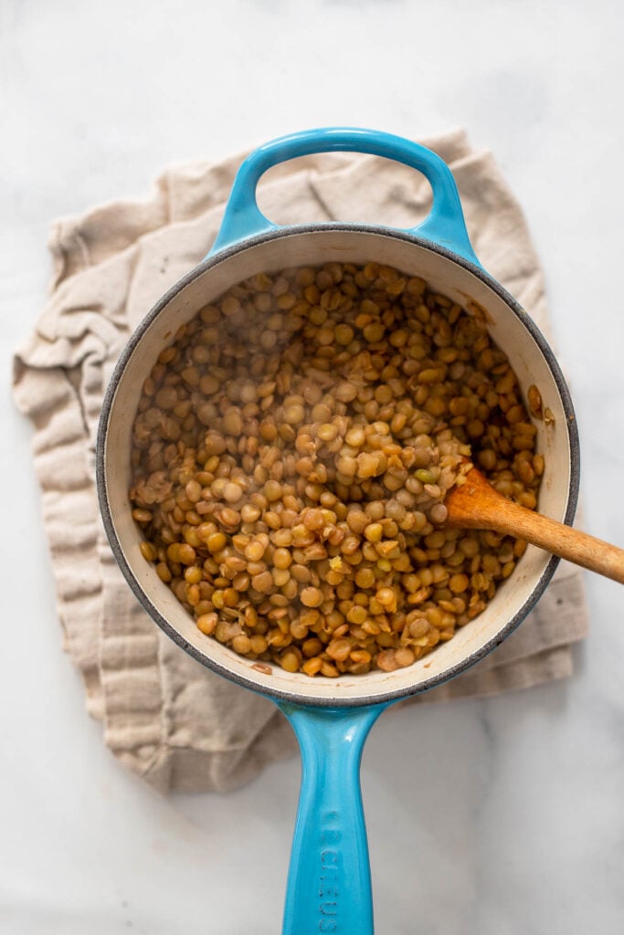 cooked lentils in small saucepan.