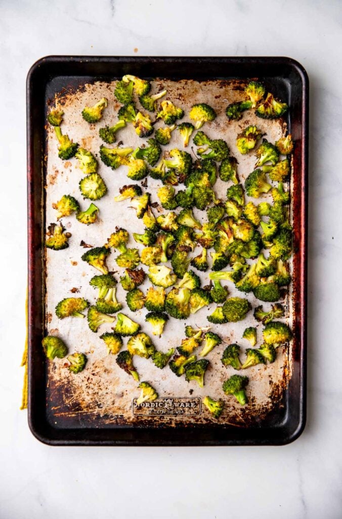 roasted broccoli on baking sheet.