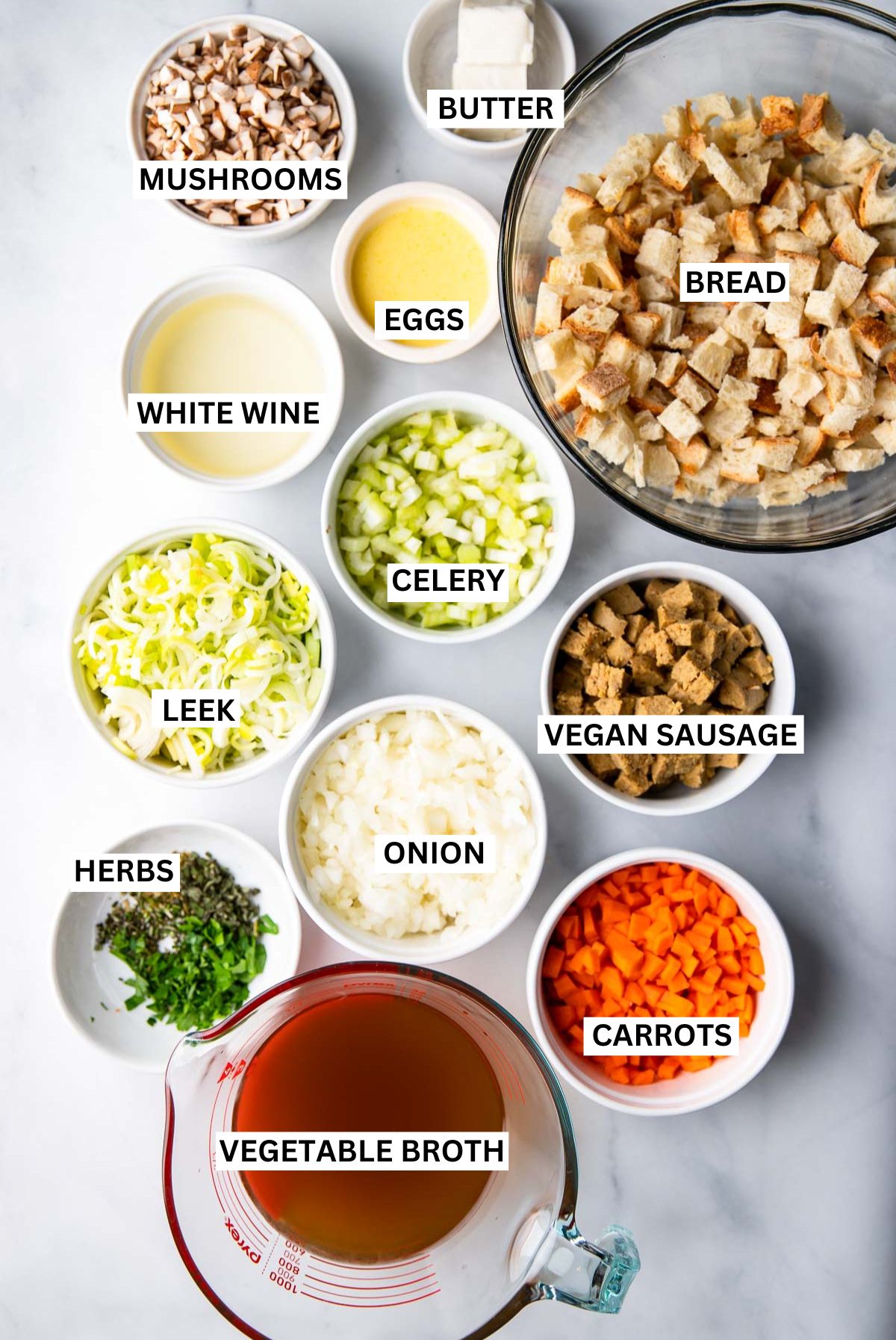 vegetarian stuffing ingredients in small bowls with labels. 