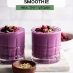 berry protein smoothie garnished with hemp hearts.