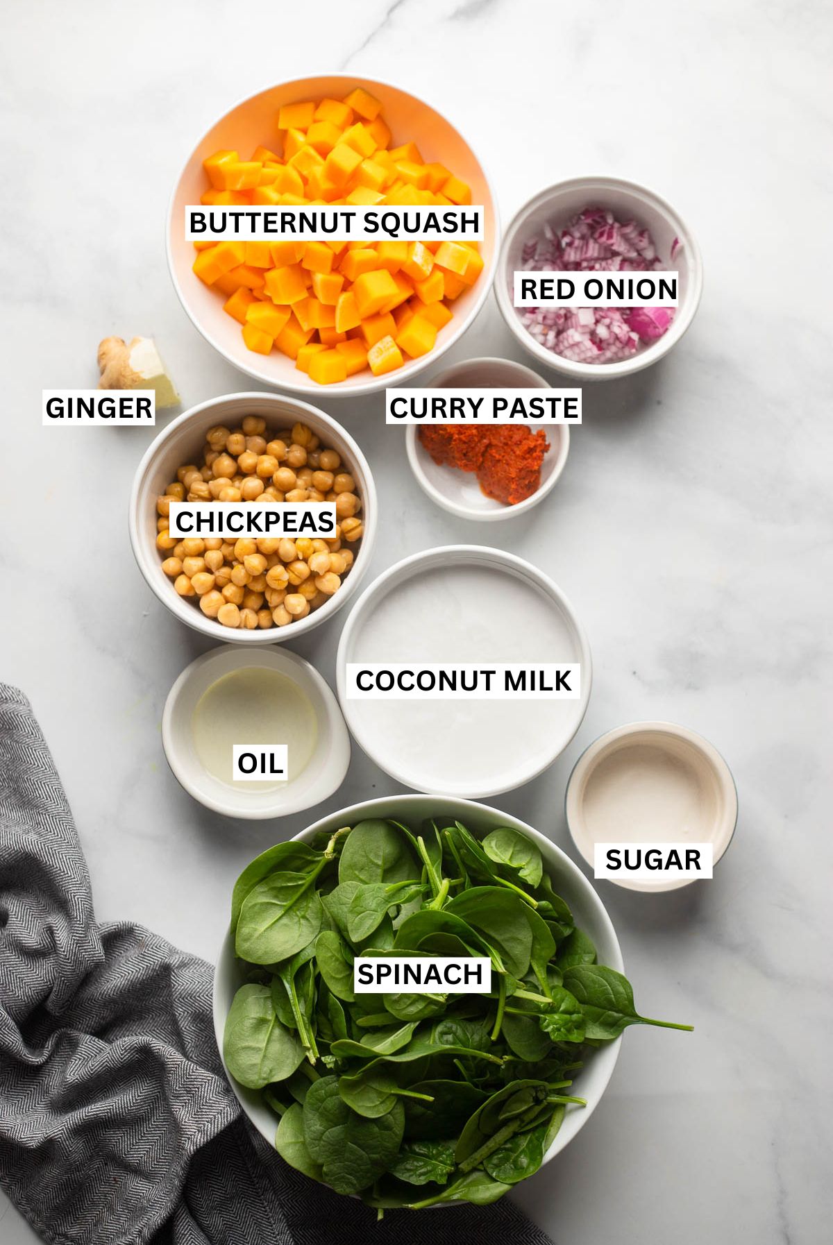 chickpea and butternut squash ingredients in small bowls with labels. 