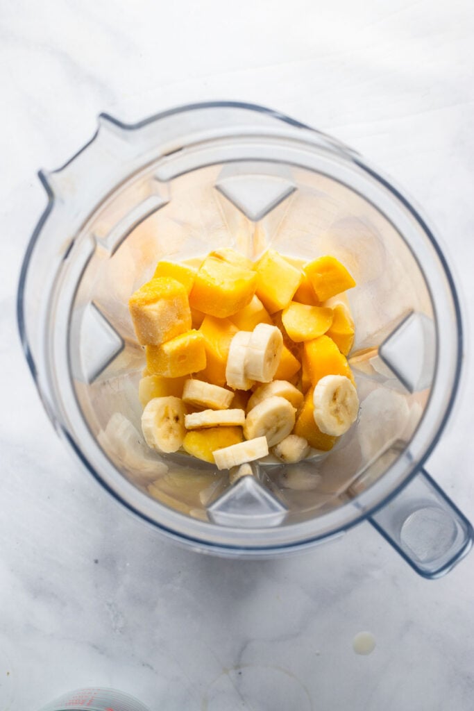 smoothie ingredients in blender before pureeing.