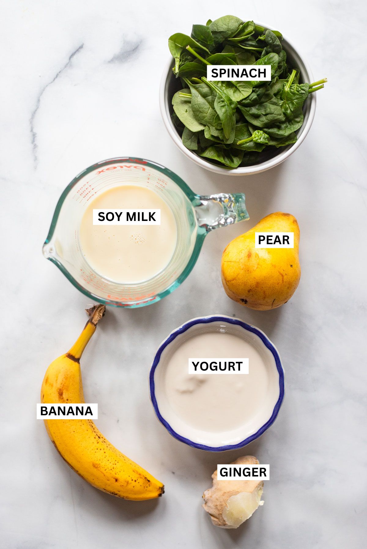 pear smoothie ingredients in small bowls.