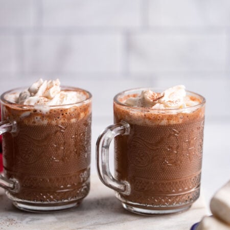 spiked vegan hot chocolate in glass mugs