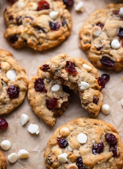 white chocolate cranberry oatmeal cookies on baking sheet.