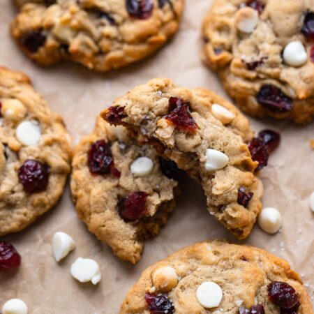 white chocolate cranberry oatmeal cookies on baking sheet.