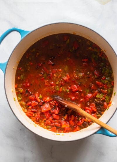 cooked peppers with the diced tomatoes, beer, and broth added. 