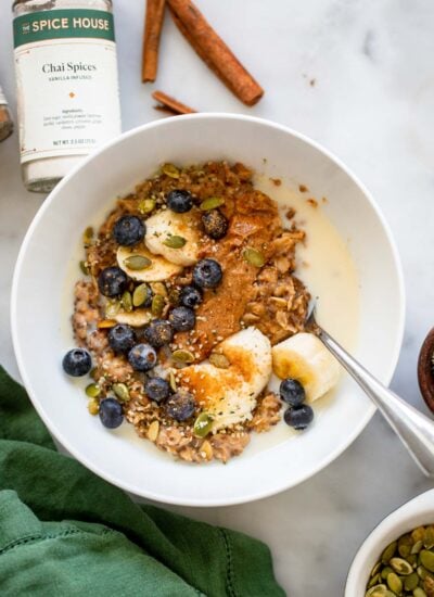 chai spiced oatmeal with almond butter, banana, and blueberries.