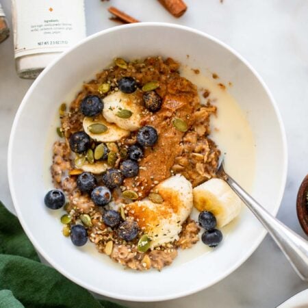 chai spiced oatmeal with almond butter, banana, and blueberries.
