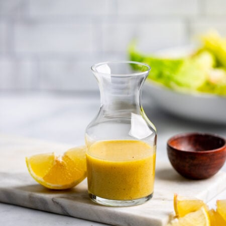 lemon dijon dressing in a glass jar.