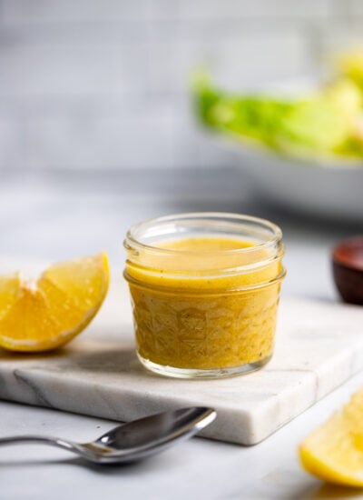 lemon dijon dressing in a small glass mason jar. 