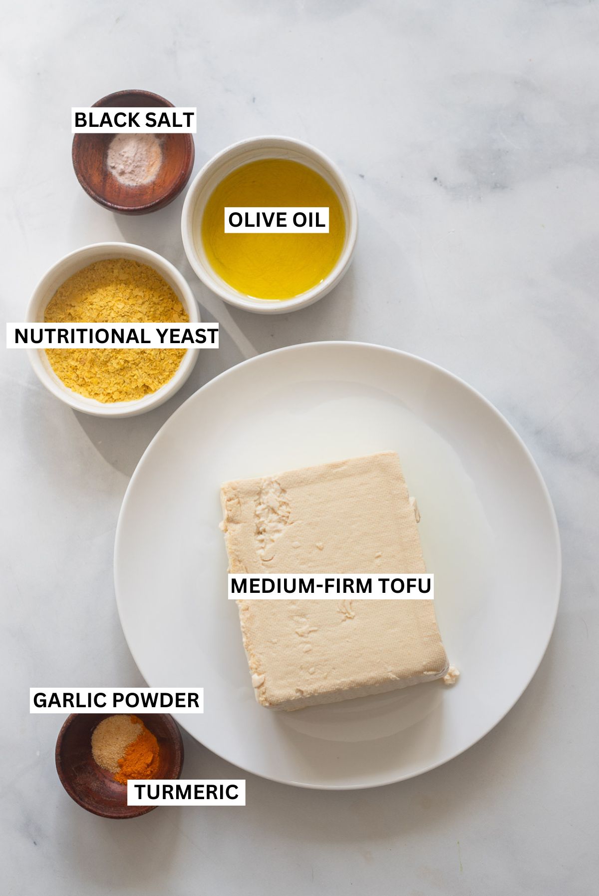 easy vegan tofu scramble ingredients on white background with text labels. 