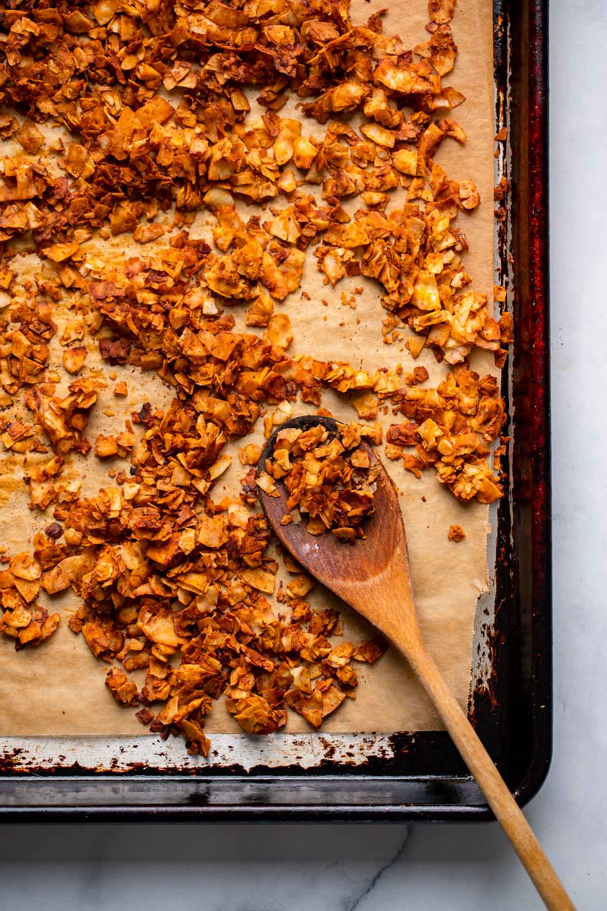 baked coconut bacon on a baking sheet lined with parchment paper. 