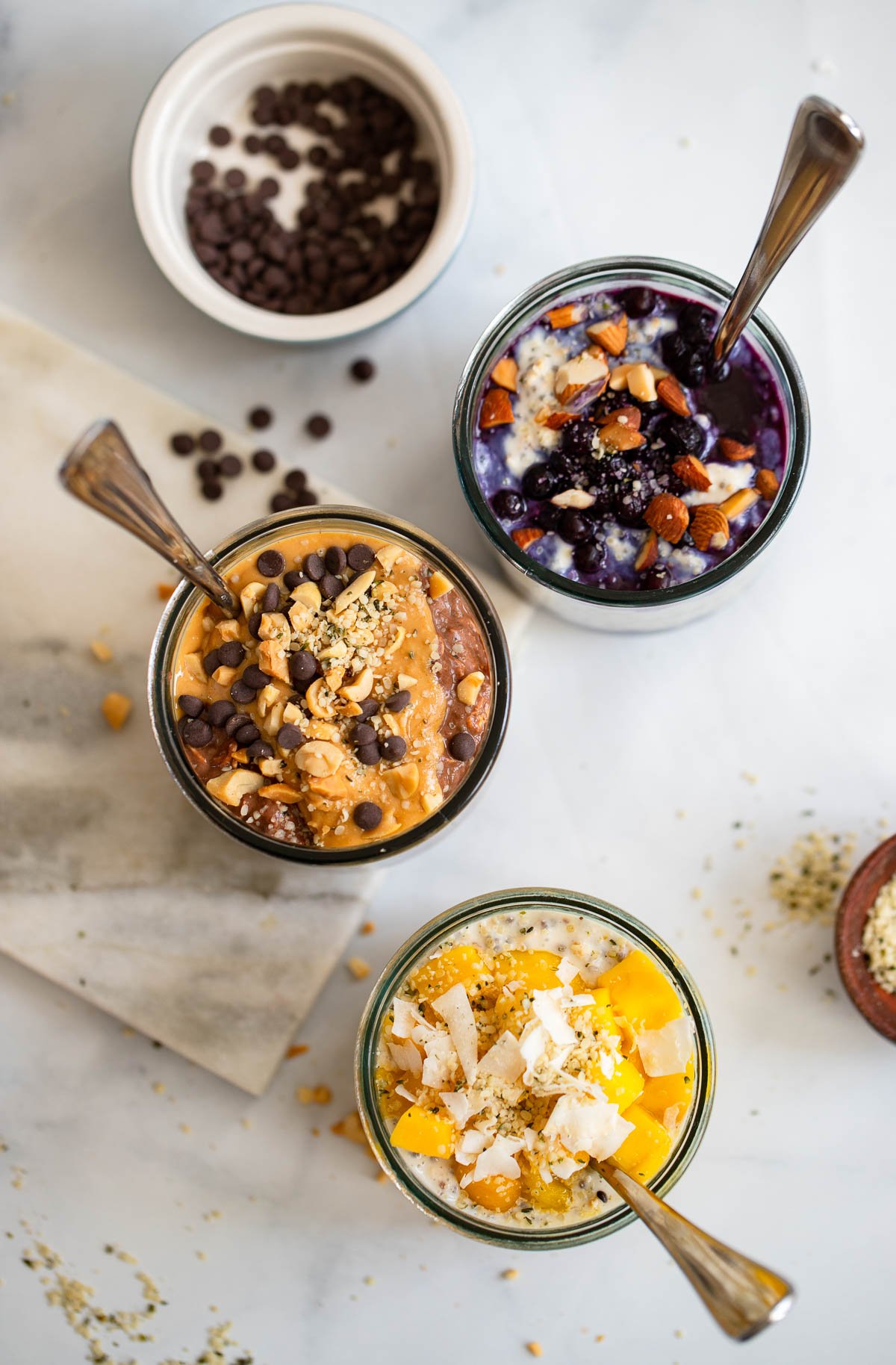 3 jars of overnight oats with different toppings.